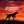 Silhouette of a Brittany against a red sunset sky, with text 'The Best Part of the Hunt, It's Not the Flush'.