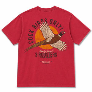 Back view of a red t-shirt featuring a flying ring-necked pheasant over an orange sun with text 'Cock Birds Only! Daily Limit 3 Roosters, No Hens Allowed!' and Uplander branding.