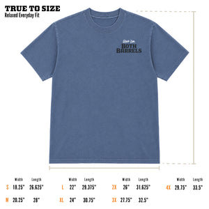 Size guide for the Double Tap t-shirt showing a blue relaxed fit tee with 'Give 'Em Both Barrels' chest graphic, labeled 'True to Size — Relaxed Everyday Fit,' with width and length measurements for sizes S through 4X.