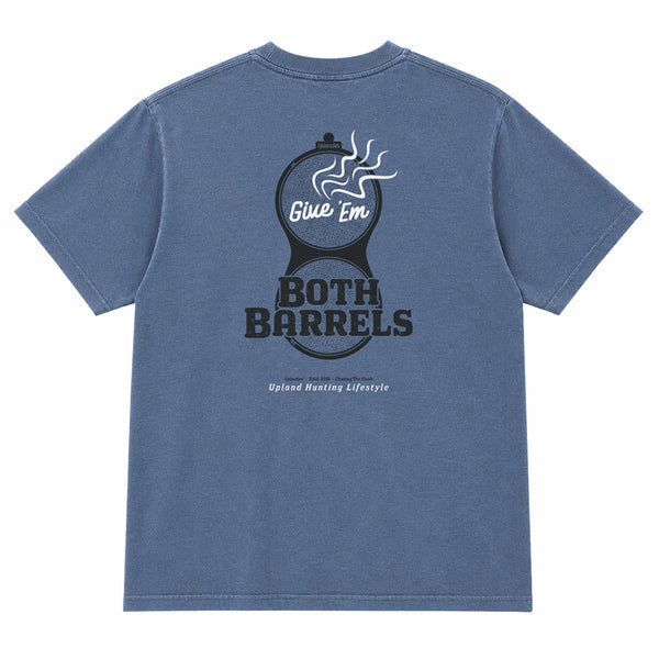 Back view of a blue t-shirt featuring a graphic of a smoking shotgun breech with 'Give 'Em Both Barrels' text and Uplander branding.