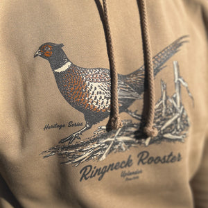 Close-up view of the vintage-style illustration of a rooster pheasant in a cornfield, with 'Ringneck Rooster,' 'Uplander,' and 'Heritage Series' script on the tan heavyweight hoodie.