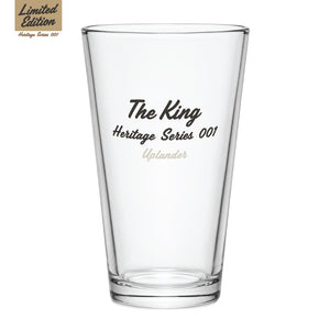 Back of a clear pint glass with text 'The King', 'Heritage Series 001', 'Uplander', with a 'Limited Edition — Heritage Series 001' badge.