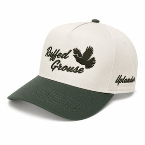 Ivory and dark green two-tone snapback hat with an embroidered flying ruffed grouse and 'Ruffed Grouse' script on the front, 'Uplander' embroidered on the side.