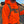 A hunter wearing a blaze orange heavyweight hoodie with 'Chasing the Flush' graphic, carrying a shotgun and wearing a hunting vest, outdoors in a field.