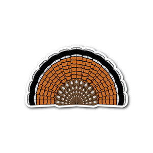 Die-cut sticker of a red phase Ruffed Grouse tail fan.